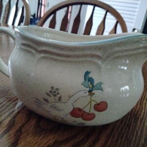 Elegant Cream Ceramic Bowl with Bird and Cherry Motif